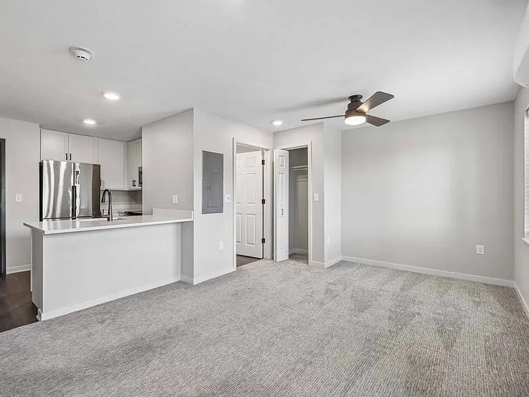 A spacious open-concept layout blends comfort and functionality, offering plenty of room to relax, gather, and enjoy everyday living.