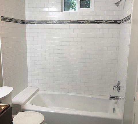 Bathroom Corian and Tile back splash-new cabinets, sink and tub
