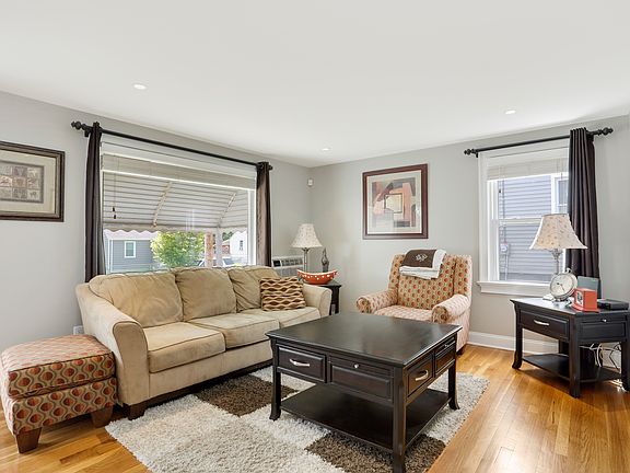 Brightly lit living area, perfect for entertaining family and friends