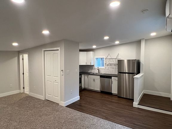 Open floor plan with high ceilings