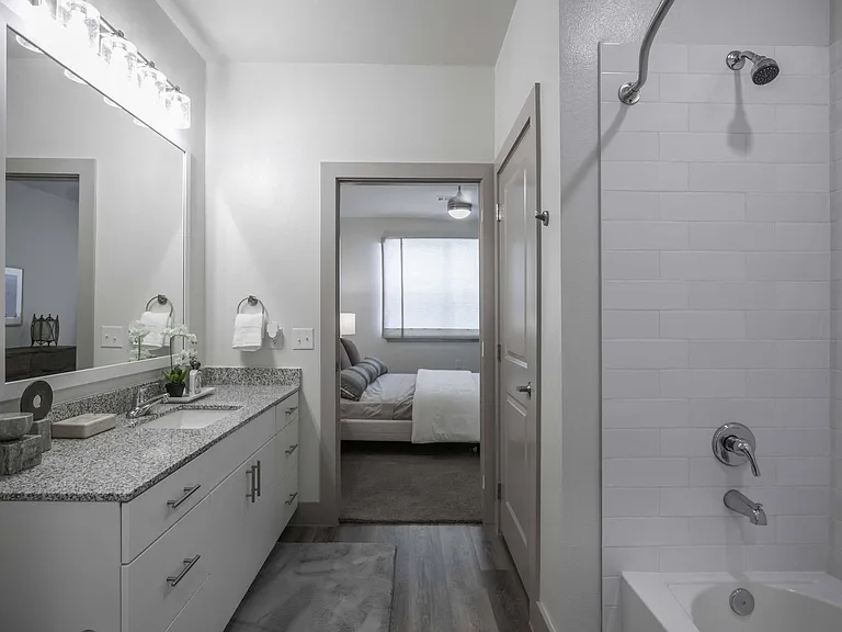 Serene bathroom with tub and shower