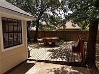 Backyard deck with table & benches