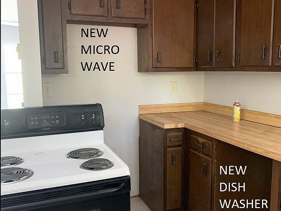 Brief view of kitchen. New dishwasher and microwave being installed next week.