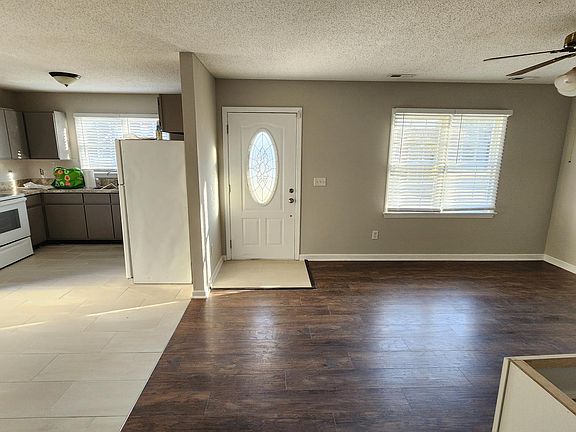 Living Room on Right, Dining and Kitchen on left