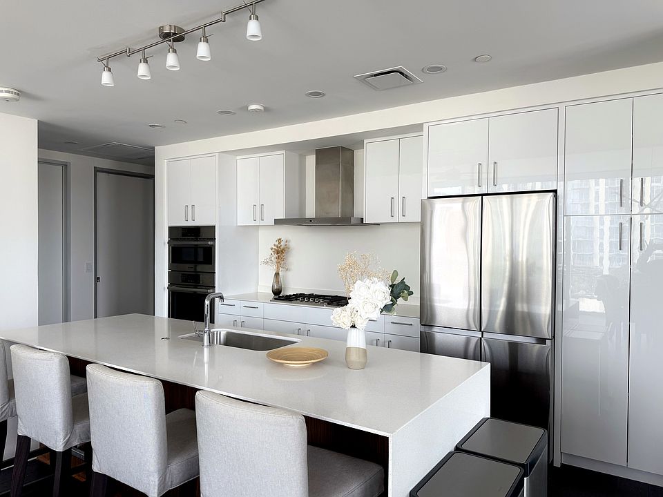 Bosch oven, microwave, gas cooktop, and dishwasher. Samsung Bespoke refrigerator. Quartz countertops.