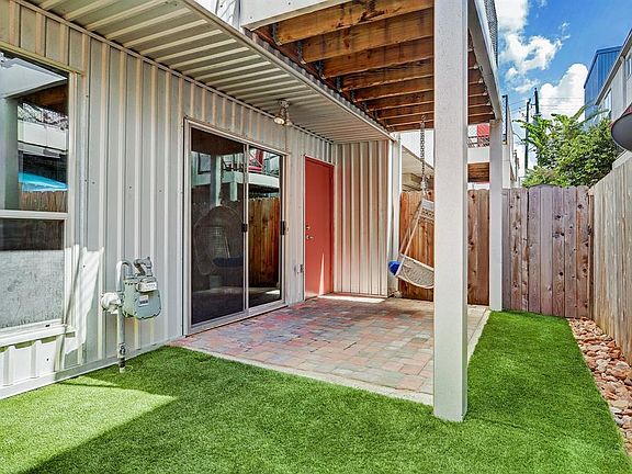 Great backyard space to enjoy on those cool nights or BBQ! Turf makes it really easy for pets.
