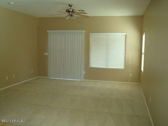 Family Room opens to Back Covered Patio and Grass Yard for lots of entertaining!