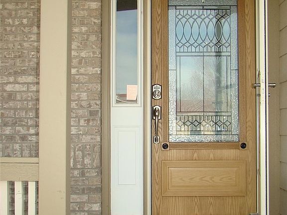 New front door with sidelight and new storm door