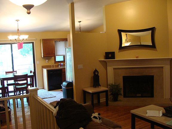 Open to Dining Room and sliding glass door to deck