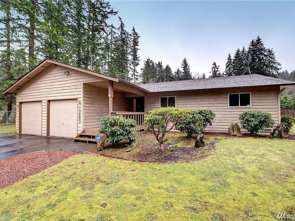 1/3 acre, mostly level yard. Large attached 2 car garage