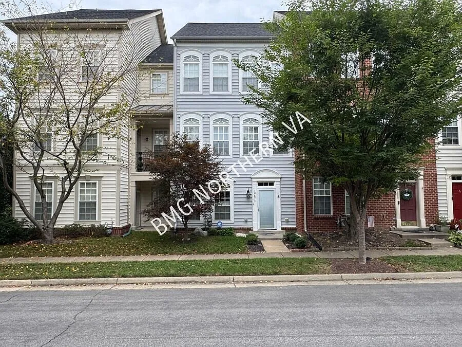 Coming Soon Spacious 3-Level Townhome with 2-Car Garage & Community Amenities in New Bristow Village — Photo 1