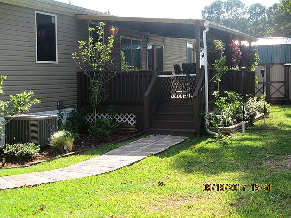 rear entrance from carport