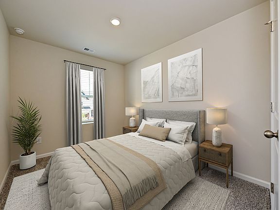 The Topaz floorplan includes two spacious secondary bedrooms.
