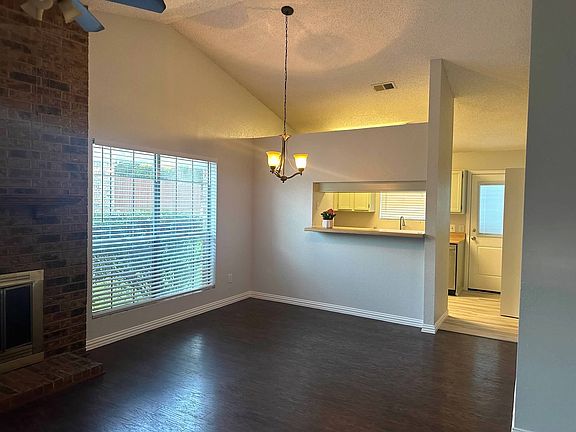 Floors have been replaced since this photo and are now same light luxury vinyl plank that is in the kitchen