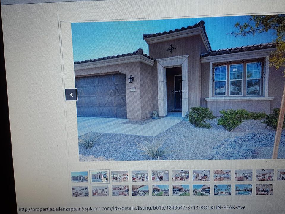 original listing photo - front of home