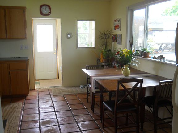 Eat-in kitchen with lovely sunset window.