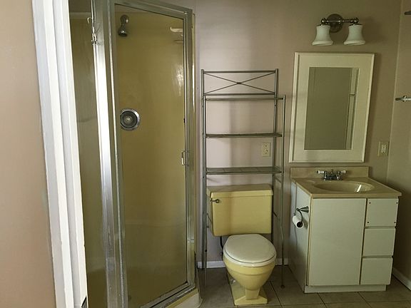 Bath with shower