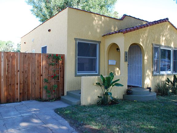 New wooden fence in driveway