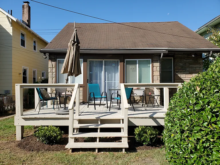 Backyard deck for relaxing, yoga stretching and BBQ grilling.