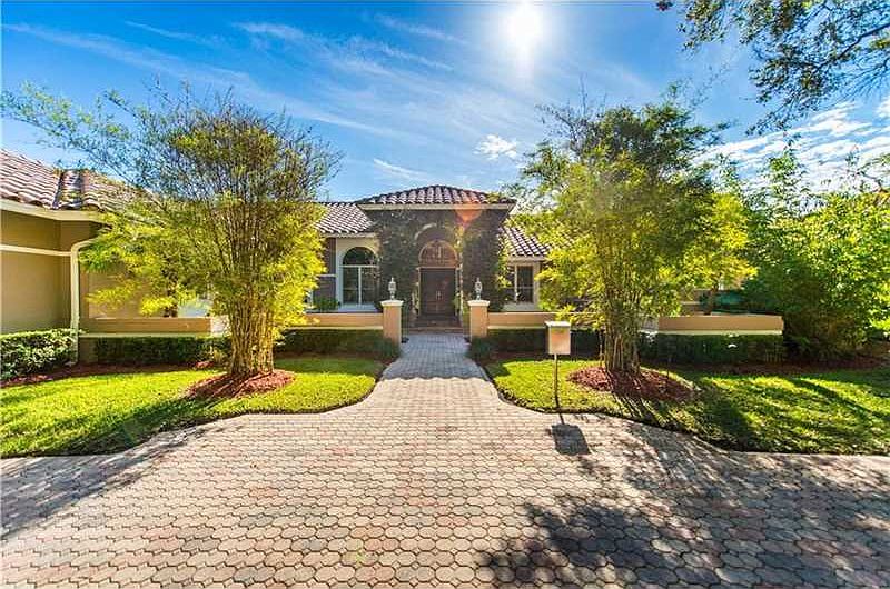 Coral Gables estate nestled on charming Old Cutler Rd.