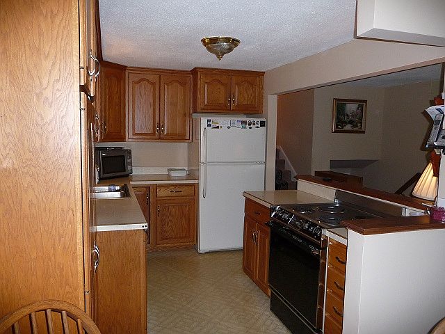 Kitchen opens to living room