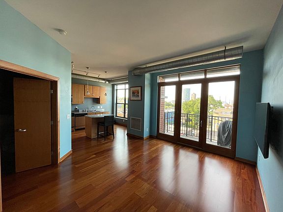 High ceilings, exposed ductwork and open concept.