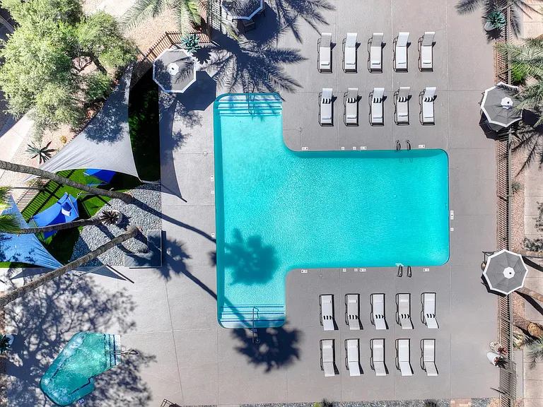 Take in the stunning aerial view of Beacon at 601's sparkling pool and sprawling sundeck. It's the perfect place to cool off, relax, and have fun in the sun.