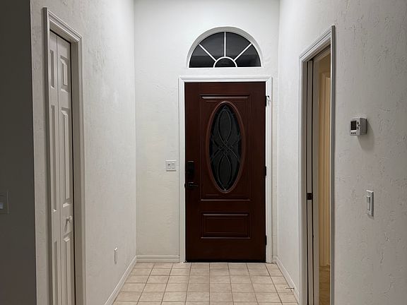Foyer leading to front door