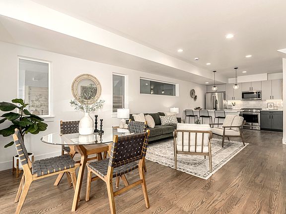 Open plan living, kitchen, dining.