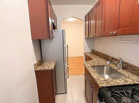 2nd image of 8615 Elmhurst Ave APT 3F