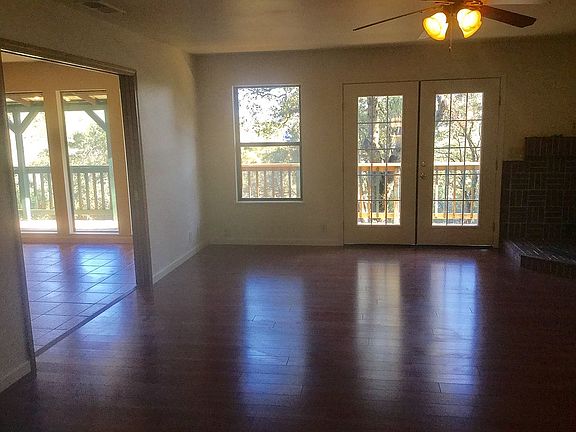 Living room, dining on left