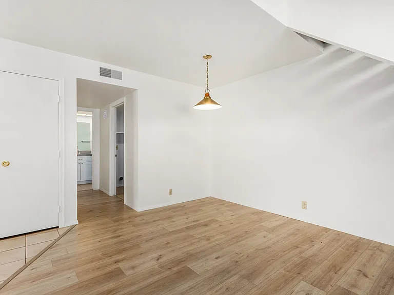 Dining Area. New paint and flooring.