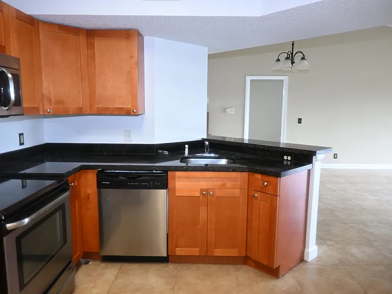 8721 Wiles Rd #305 — Photo 44