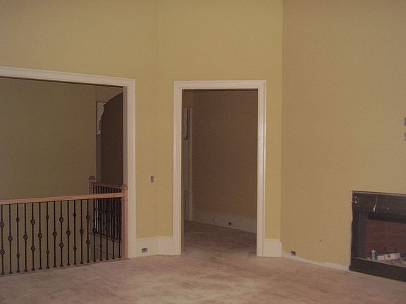 Familyroom w/ view of stairs to basement