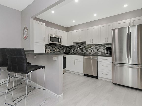 Modern kitchen with all stainless steel appliances