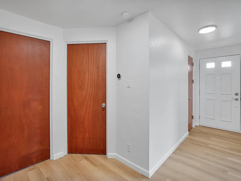 front entryway with closet by front door