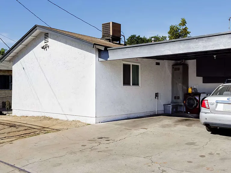 2 - 3 parking located at back of the house - alley access (depends on vehicle size - small to mid size vehicles generally fit 3 - oversized large vehicles may only fit 2 )