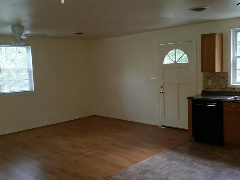 Entrence door/living room with nice wood flooring