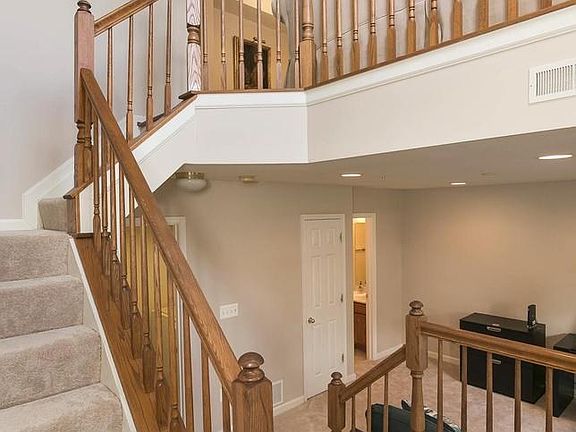 Open Views down to lower level, up to Family Room