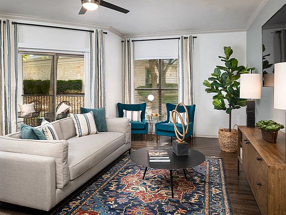 Exceptional living spaces feature luxury vinyl plank flooring and crown molding