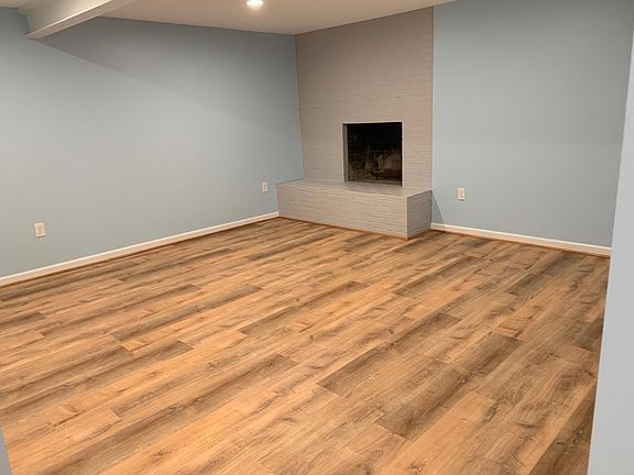 Spacious bedroom with fireplace
