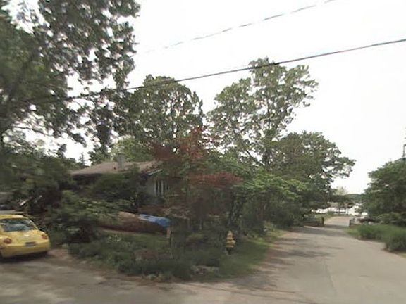 lot with beach in background