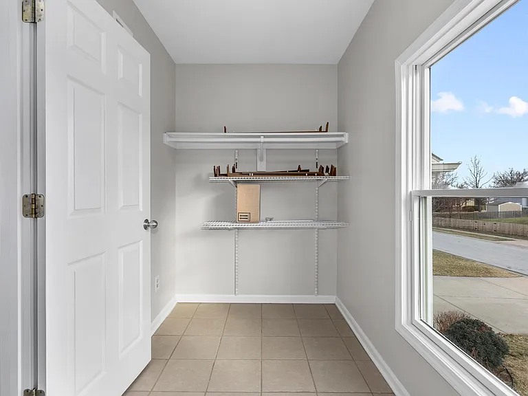 laundry room opposite of where the washer and dryer could go