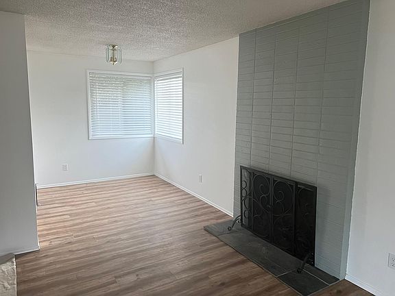dining room and fireplace in living room