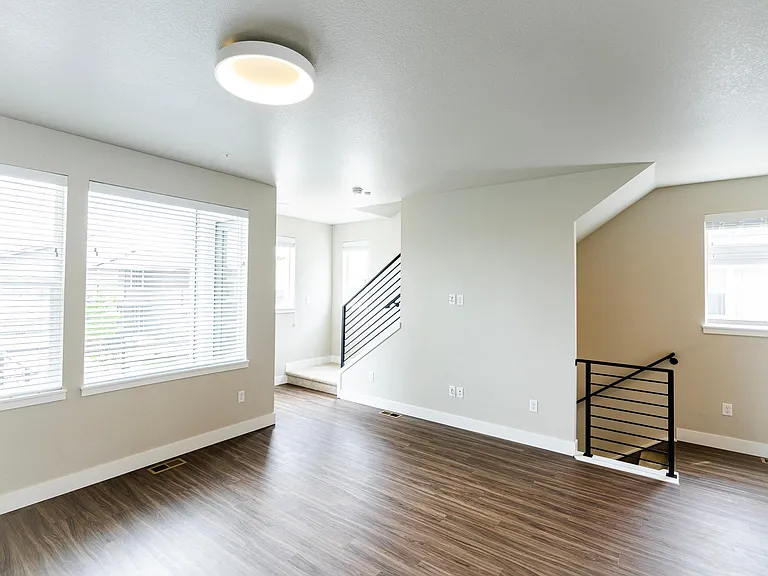 Living area, balcony outside the windows on the left