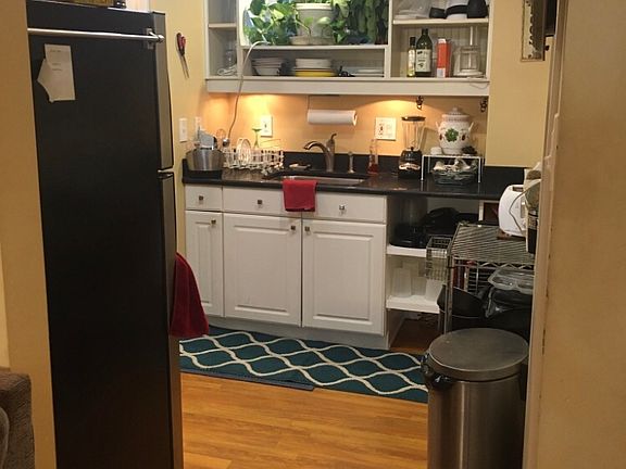 Ceiling fan in bright kitchen.