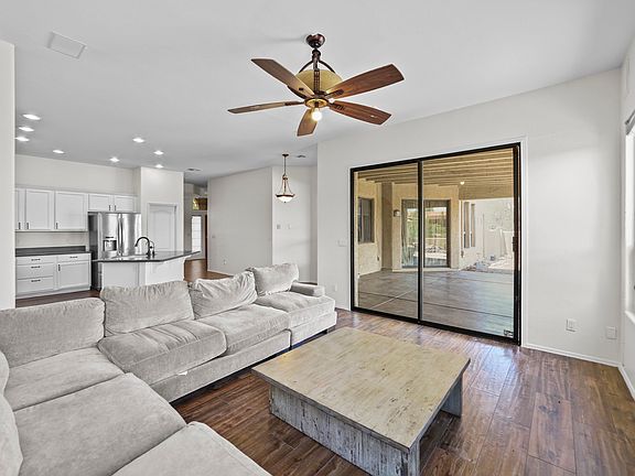 open concept family room with kitchen and nook