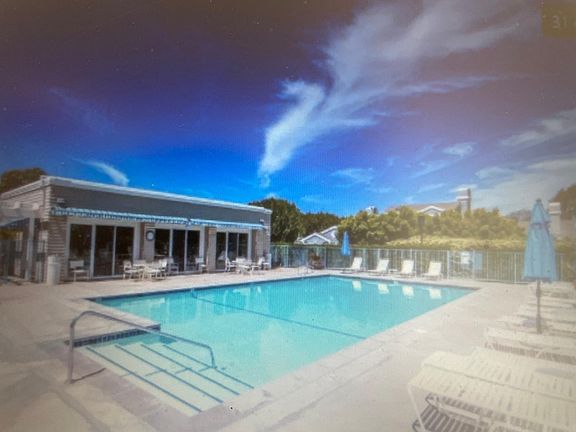 Club house with pool and jacuzzi