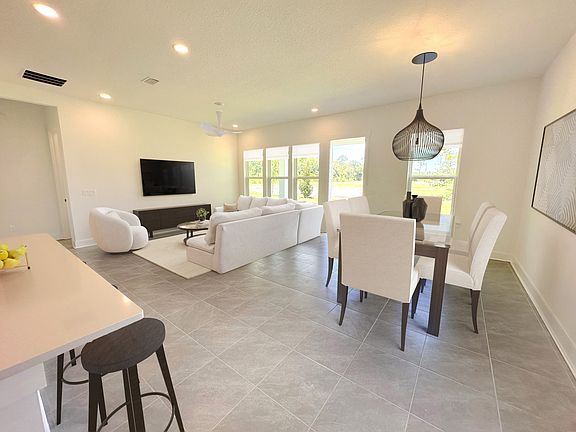 Virtually staged. Light and bright, casual, indoor-outdoor living.