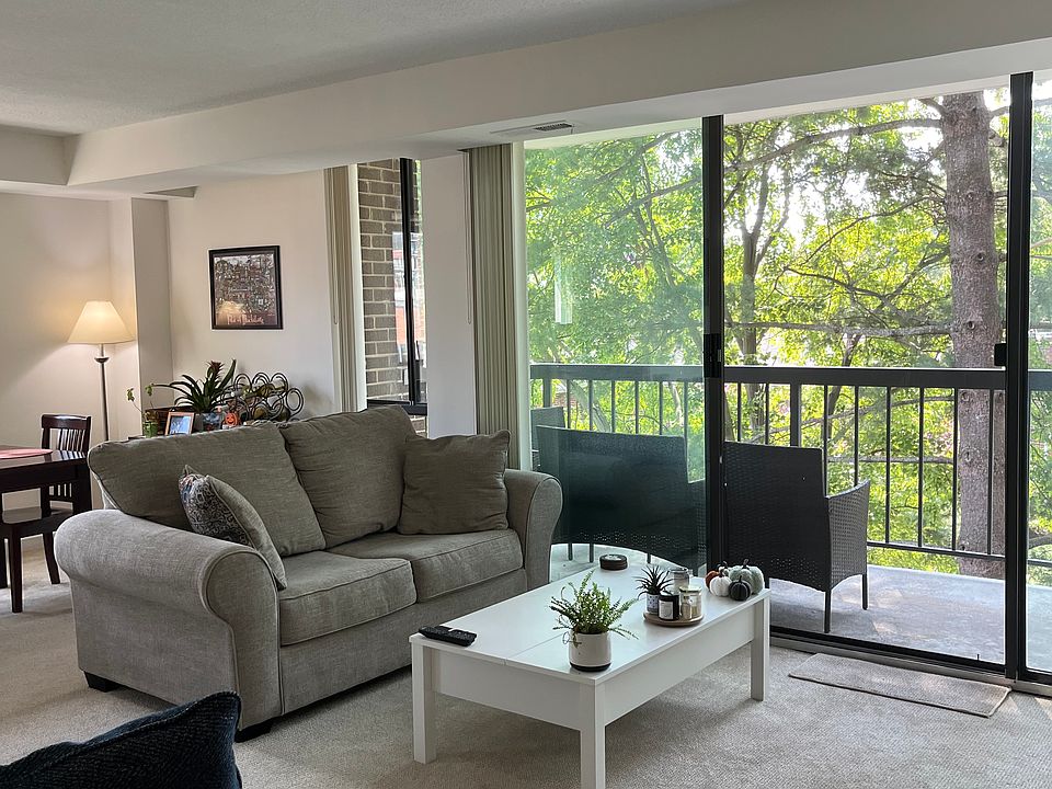 Large living room accommodates sofas and dining furniture so dining room may be used as WFH space.